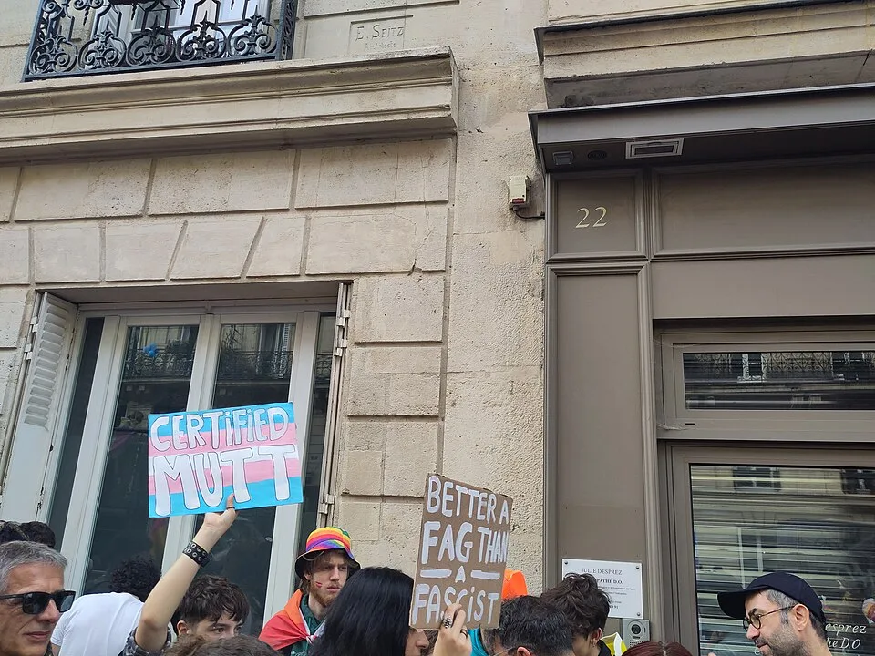 Protest sign reading “Better a fag than a fascist” at “Paris Pride — 3 October 2026” in Paris, France.