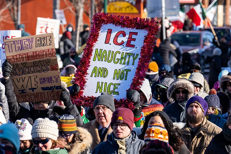 Protest sign reading “ICE: naughty and not nice”, photographed in Minneapolis, United States.
