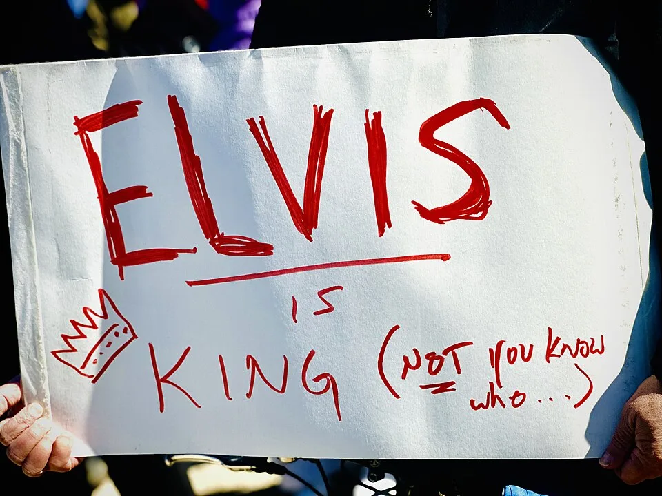 Protest sign reading “Elvis is king (not you know who...)”