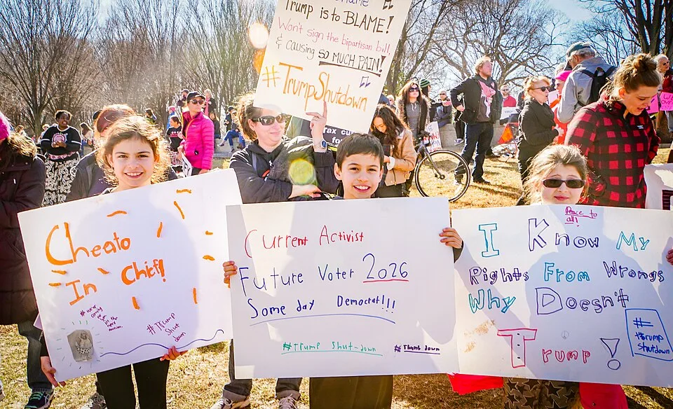 Protest sign reading “I know my rights from wrongs. Why doesn't Trump?”, photographed in Washington, United States.