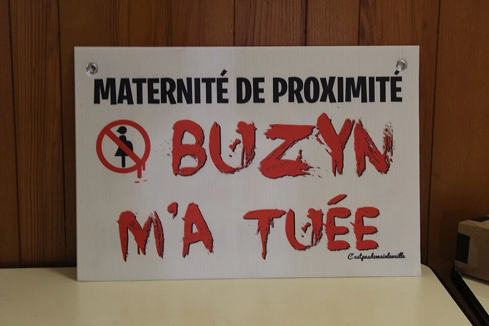 Protest sign reading “Buzyn m'a tuée”