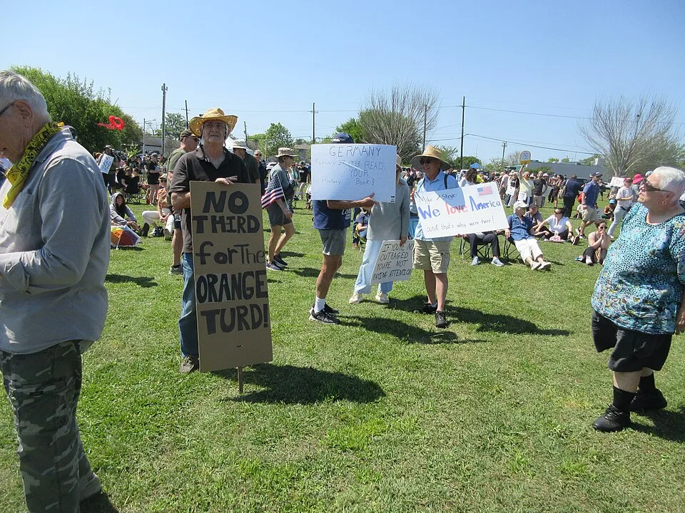 Protest sign reading “No third for the orange turd!”, photographed in New Orleans, United States.
